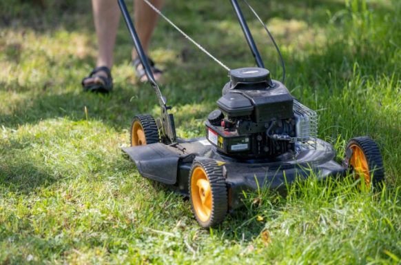 someone mowing a lawn