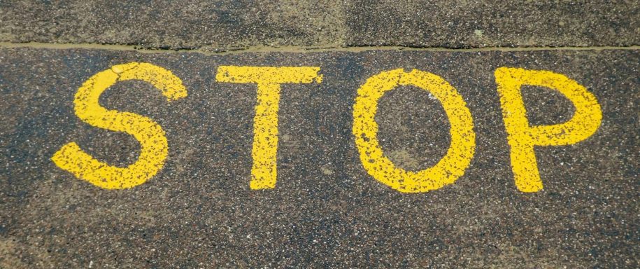 Stop sign on the pavement