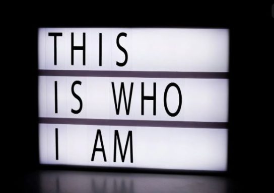 A light box which reads this is who I am