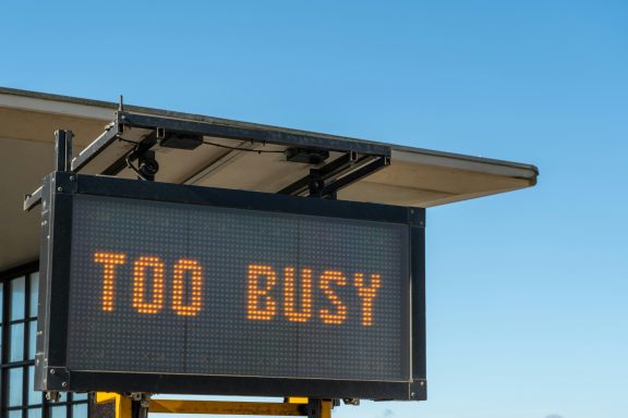 Large sign which says too busy